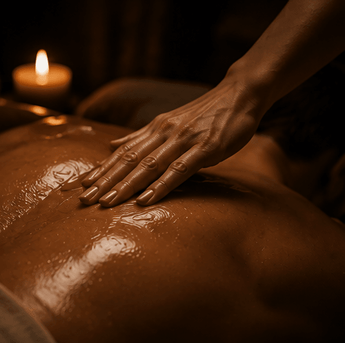 Candlelit massage ritual with warm atmospheric light